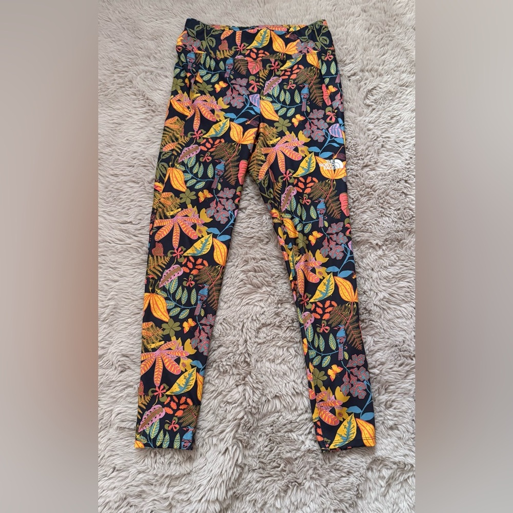The North Face Black and Orange Leggings Vibrant Design